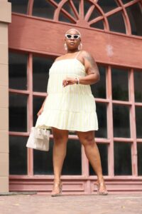 Fashion influencer Kai Michelle in an off-white sundress