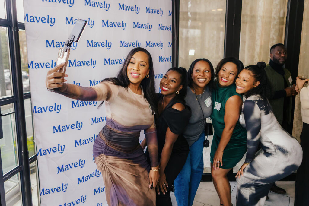 Atlanta influencers take a selfie at Mavely meetup