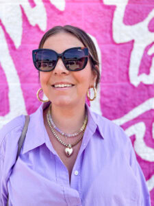 Mavely creator Jen Taylor poses in sunglasses