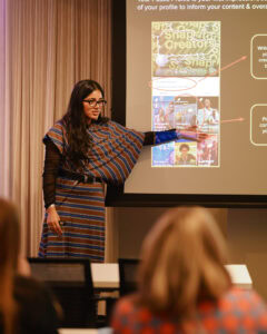 Varshini Satish from Snap Inc. speaks at a Swipe Up creator education workshop