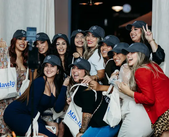 Influencers pose for a group photo at Mavely Denver